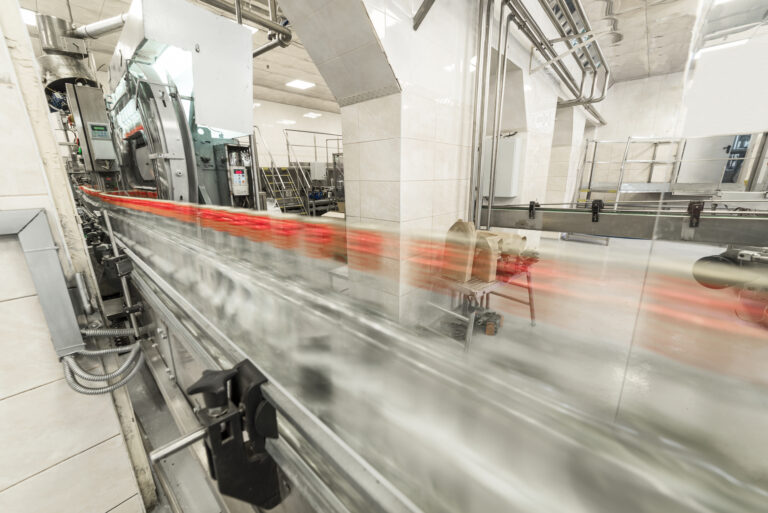 Bottles with vodka on the conveyor