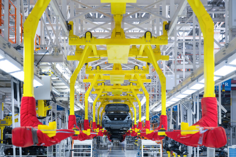 Movement of vehicles along the production line at the plant. Car Assembly shop